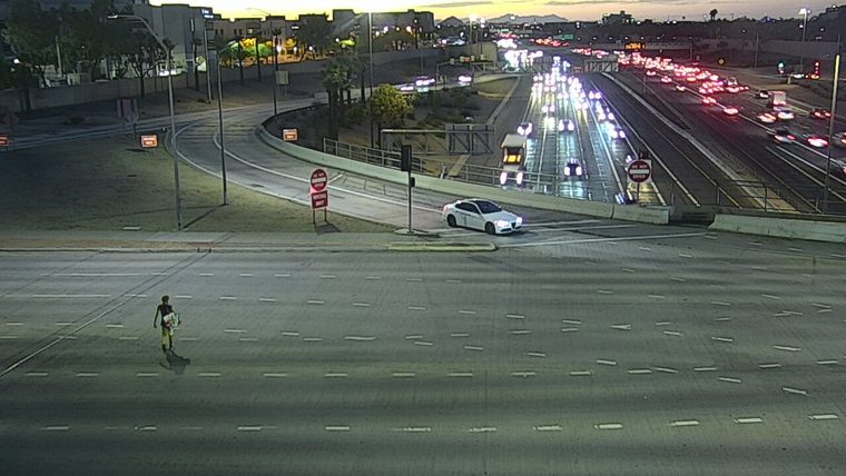 Person walking in the roadway