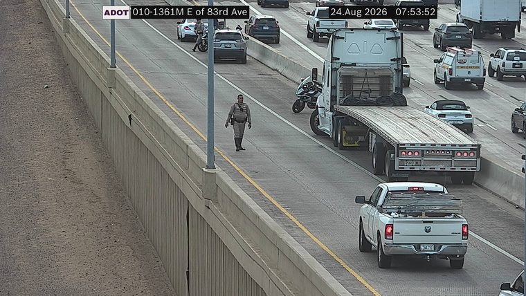Person walking in the roadway