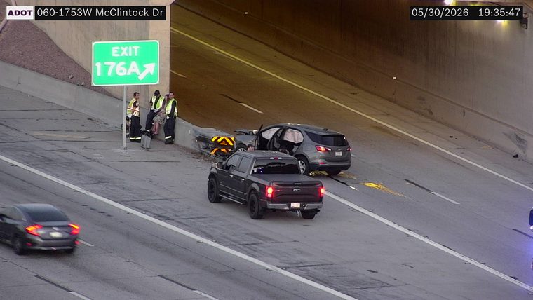 Two vehicles collided in the right lane with deployed airbags and debris
