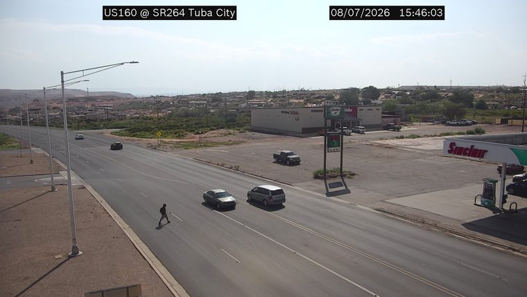 Person crossing the roadway in the left lane
