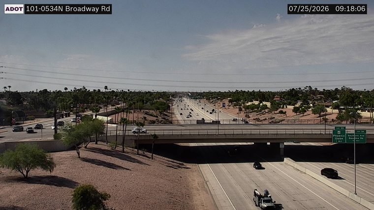 Tow truck on the right shoulder
