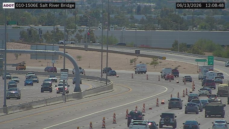 Orange traffic cone and debris in the right lane