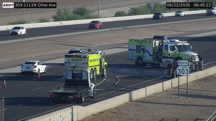 Rural Metro Fire vehicles and personnel on the right shoulder