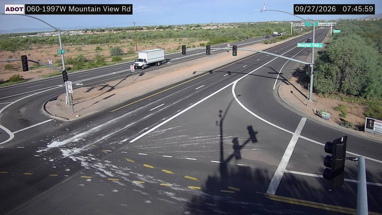 White substance spilled across multiple lanes of the intersection