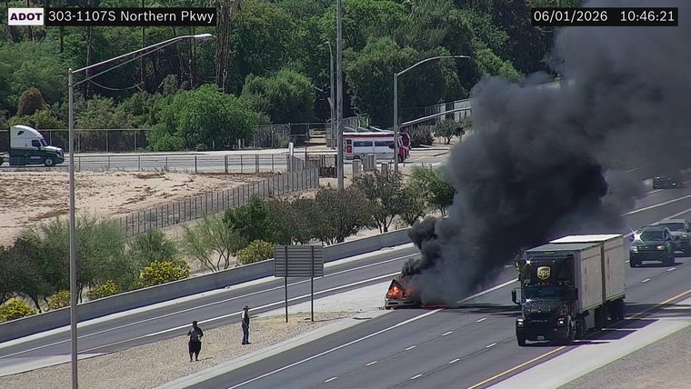 Vehicle fire with heavy smoke in the right lane