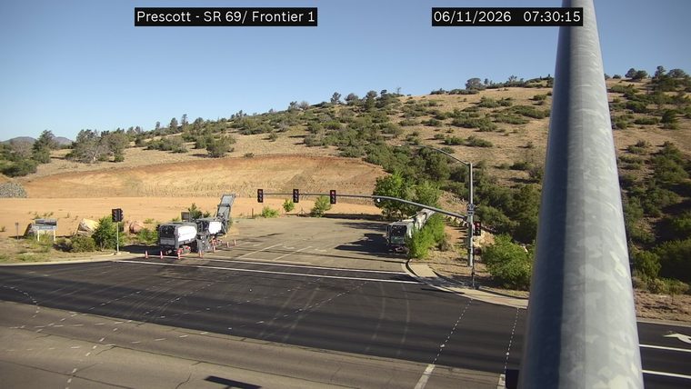 Construction equipment and cones in the right lane