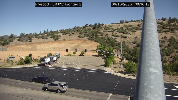 Construction equipment and cones in the right lane