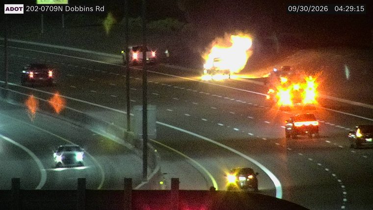 Vehicle on fire in the right lane