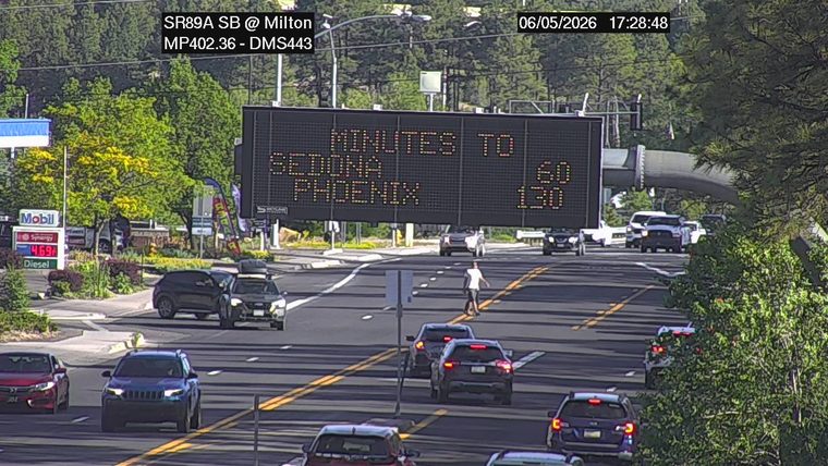 Person walking in the roadway