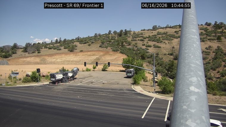 Construction equipment and cones in the right lane