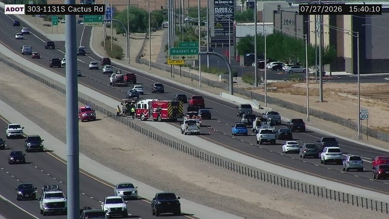 Fire engine and other emergency vehicles on the right shoulder