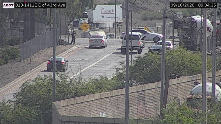 Cement truck overturned in the right lane