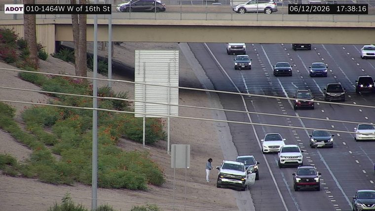 Fire truck and emergency personnel on the right shoulder