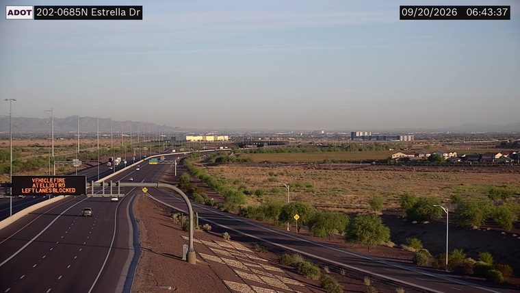 Vehicle fire in the left lanes