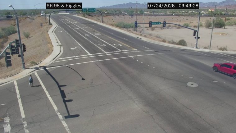 Person crossing the street in the crosswalk