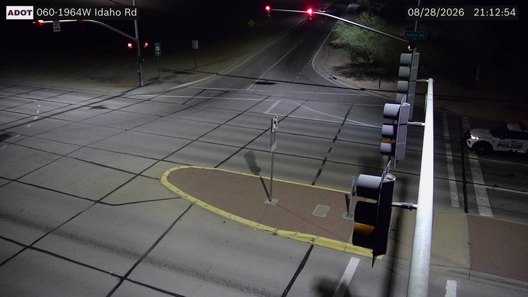 Police car on the right side of the roadway