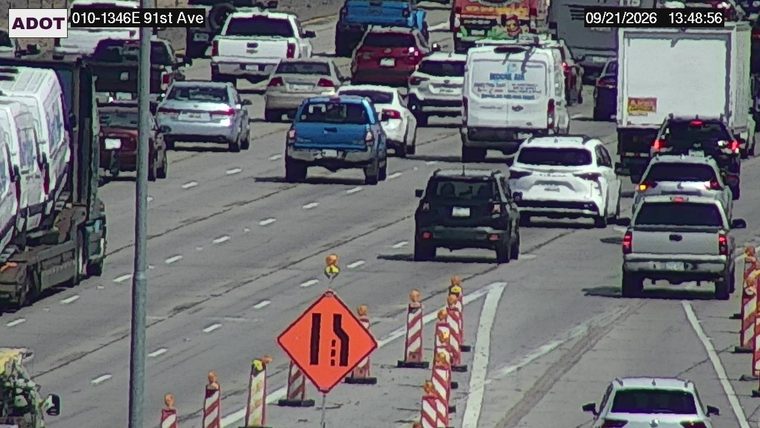 Construction cones and a lane closure sign in the right lanes