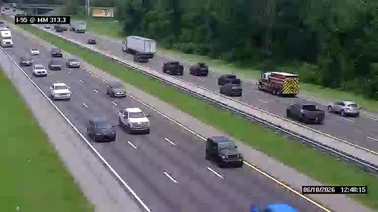 Fire truck on the shoulder of I-95, responding to an incident.