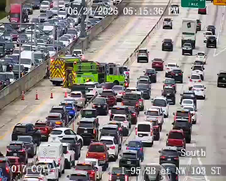 Fire truck and emergency personnel in the left lane