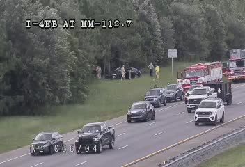 Multiple vehicles and emergency responders in the median