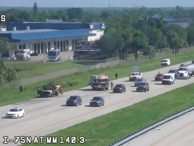 Emergency responders on scene with multiple vehicles on the highway.