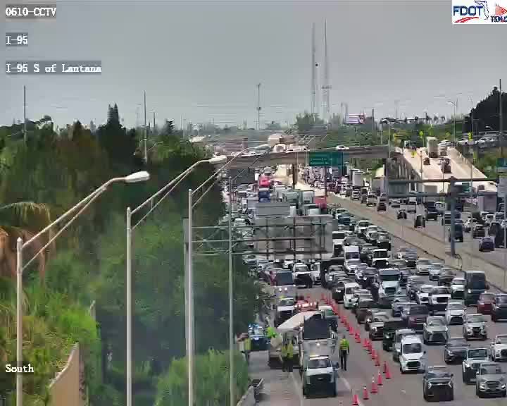 Traffic incident with responders and cones on I-95 South of Lantana.