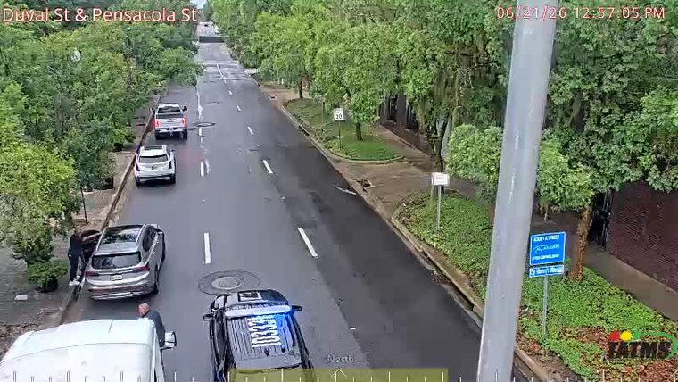 Police car with blue lights on the roadway