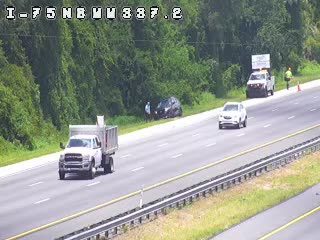Emergency responders and vehicles on the shoulder of I-75 NB MM 337.2.