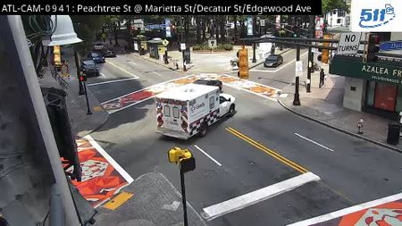 Ambulance on scene at intersection, Peachtree St & Marietta St/Decatur St/Edgewood Ave.