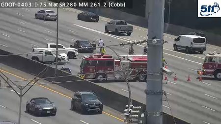 Fire trucks and personnel on scene of a multi-vehicle incident on I-75 North.