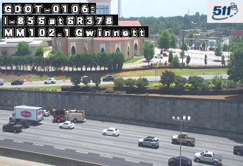 Fire truck and tow truck on the right shoulder