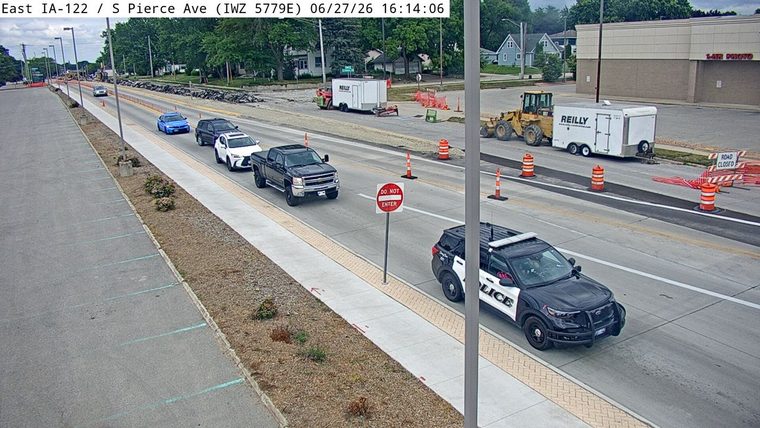Police car with lights on the right shoulder