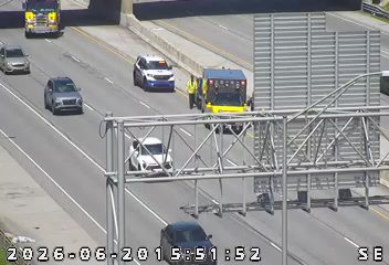 Ambulance and police car with lights on the right shoulder