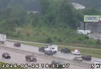 Police car with lights on the right shoulder