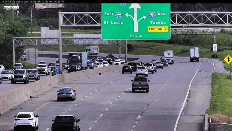 Debris is visible on the roadway in the left lane.