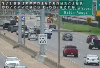 Fire truck and police car with lights on the roadway