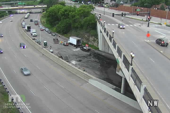 Debris and a vehicle in the left lane