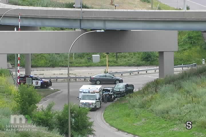 Police car and ambulance on the right shoulder