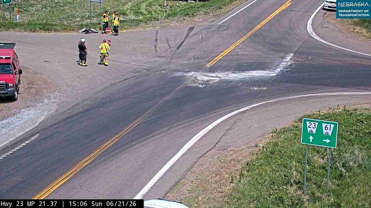 Fire truck and emergency personnel on the roadway