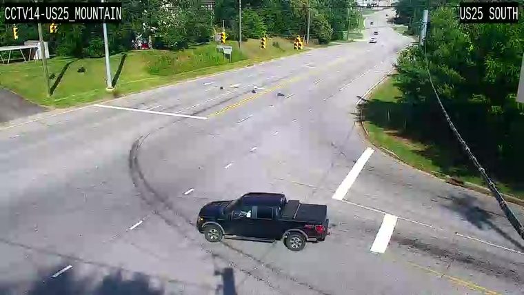Debris scattered across the roadway, potentially from a past incident.