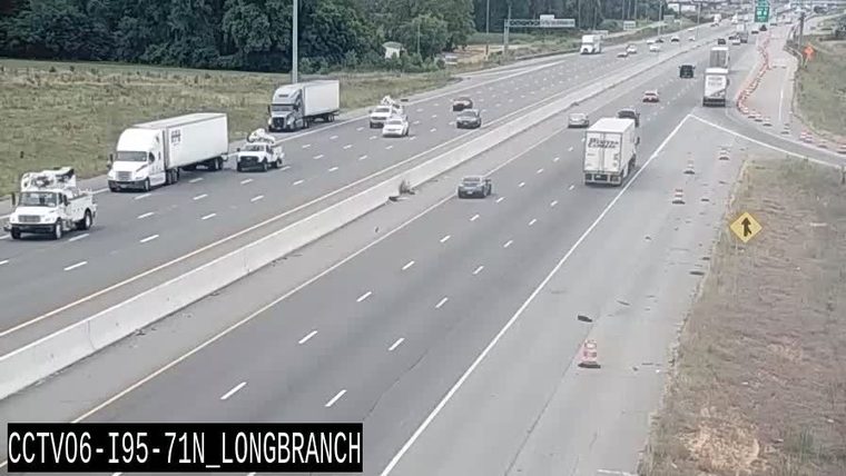 Debris scattered on the roadway, potentially hazardous to traffic.
