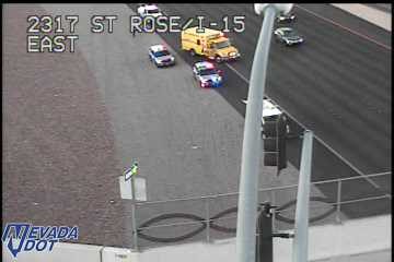 Police car and ambulance on the right shoulder
