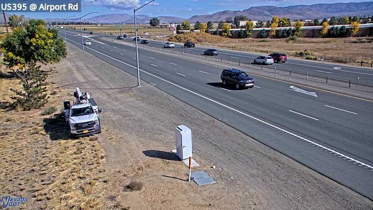 Truck with a crane on the left shoulder