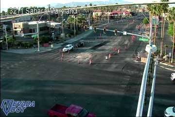 Construction cones and barrels blocking lanes in the intersection