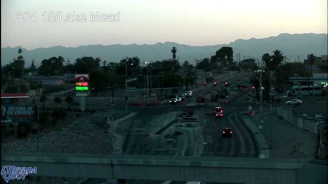 Construction zone with cones and equipment in the middle of the roadway
