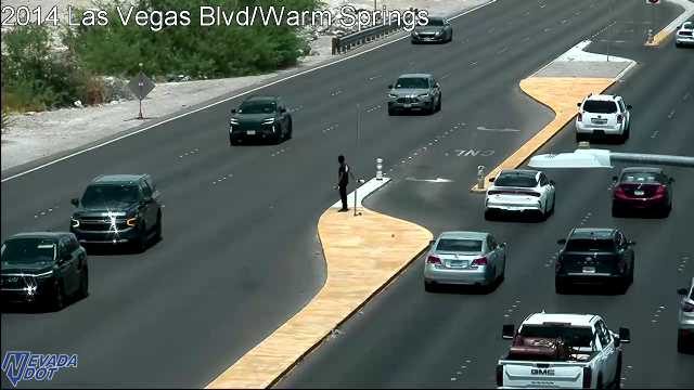 Person standing on the median