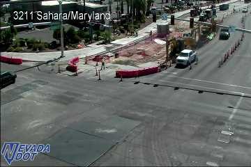 Construction cones and a worker in the right lane