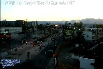 Construction cones and barricades blocking lanes on the left side of the road