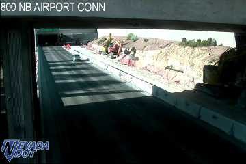 Construction equipment and barriers in the right lane