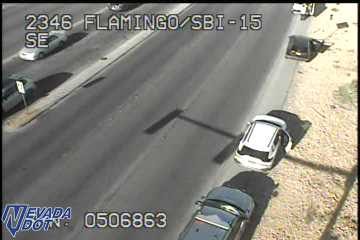White SUV on the right shoulder